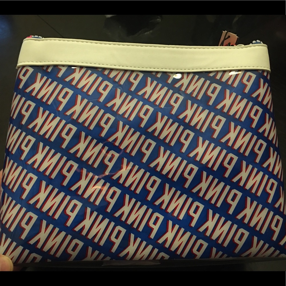 NWT. Plastic Victoria Secret cosmetic bag.